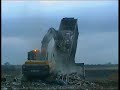 unloading an articulated tipper on a landfill site