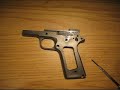norinco 1911 commander re-assembly part 1, the frame. step by step instructions, if you have a question post it and i will answer it.