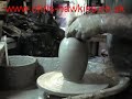 Throwing Raku bottle with tall neck