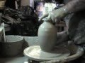 Throwing Raku bottle with tall neck
