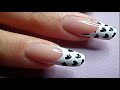 Cute hearts nail art over a French manicure