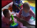 Baby Natalie playing with friends