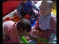 Baby Natalie playing with friends