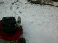 Cutting the snow with a lawn mower