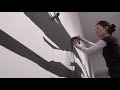 Artist Sun K Kwak is spending some serious time at the Brooklyn Museum. Her installation process will take around two hundred and eighty hours to complete. In that time Kwak will shape a gallery with around three miles of masking tape.
