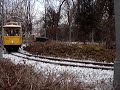 G scale trolley operating on outdoor layout