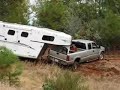 With the help of one tow-truck, one pickup truck, a large ponderosa pine, several cables, winches, pulleys and chains, Extreme Towing of Placerville did a most excellent job of carefully extracting the truck-n-trailer from their precarious perch.The only bad part was when the chain anchoring the cable to the tree, to get the right angle to get to the ball hitch on the back of the truck, snapped causing me to curse in fright. The chain flew off and hit the fender on the trailer, bending it in, but it could have been much worse.Either way, I am much relieved to have everything on solid ground again.