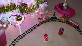 Lilly rides on a Christmas train and eats cookies