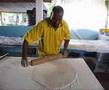 Preparing Parata Roti and Curry