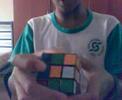 Shahrul solving rubik`s cube 3x3x3 ..quite fast (: singapore