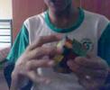 Shahrul solving rubik`s cube 3x3x3 ..quite fast (: singapore