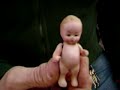 GERMAN AL BISQUE KEWPIE TYPE DOLL