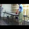 dad plays ping pong