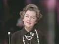 Rosalind Russell receiving a special Oscar® statuette