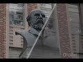Using Photographs to Enhance Videos of a Static Scene