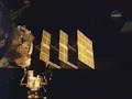 Retraction of the port solar array on Zarya