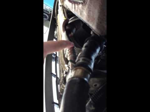 Fixing leaking transmission cooler line on 2002 Ford Taurus