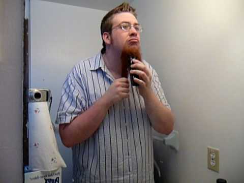 The shaving of a chin beard