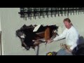 Repair a hole in a Wall. Plastering contractors.