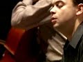 videoclip with pieter wispelwey and dejan lazic playing their instruments.