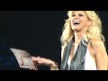 faith hill shows her comedic side while chatting up a fan during her recent concert.  her tone defintely changed later in the concert when she dressed down a fan for the 