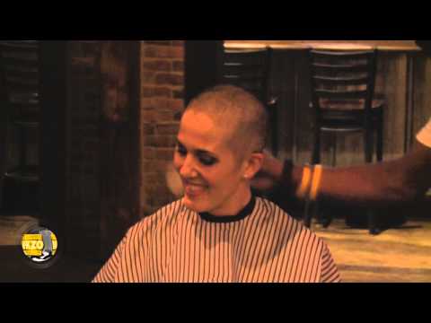 Jayni Angeli, who is battling cancer, shaved her head Wednesday night ahead of racing in the 5k of the Kalamazoo Marathon 