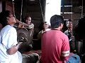Tampuan Indigenous people playing traditional instruments.