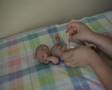 How to dress an OOAK baby doll without breaking it!