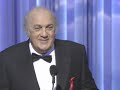 filmmaker federico fellini receiving an honorary academy award�, in appreciation of one of the screen's master storytellers. presentation by sophia loren and marcello mastroianni - 65th annual academy awards� in 1993.
