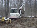 excavator moving a cross site