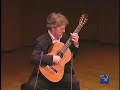 eliot fisk performing ernesto halffter's habanera at the new york guitar festival's third biennial guitar marathon at the 92nd street y's kaufman auditorium.