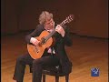 eliot fisk performing ernesto halffter's habanera at the new york guitar festival's third biennial guitar marathon at the 92nd street y's kaufman auditorium.
