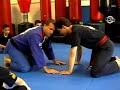 pro-star mma grappling director jerry jones teaches a guillotine choke drill to kids. 1-877-274-4846
prostar pro-star www.prostarmma.com kickboxing grappling bjj brazilian jiu jitsu jiu-jitsu kick boxing punch thai mixed martial arts mma ufc ultimate fighting championship pride ifl ultimate fighter joe brignoli joey joseph jerry jones john graden david bybee frank shamrock chuck norris liddell bas rutten gracie mata teachers association kids karate taekwondo tkd drills clearwater palm harbor fl florida nutley nj new jersey kids jab cross overhand right hook to body uppercut upper cut focus pads mitts sparring games left hook thai kick straight right straight knee thai knee clinch full mount side mount escape roll guard half full butterfly head north south takedown take down single double sprawl arm bar hammer lock hammerlock reverse keylock key lock bearhug bear hug forearm fore arm snatch low leg headlock front fight stance fighter defense 1 2 3 4 stand up standup position full nelson pass catting out guillotine counter scoop class classroom movement knee kneebar pummel over and under plum tie up tie-up block blocks warmup warm-ups warm ups spin active standing ankle pick foot touch back backward backwards jump side sidekick hook front transition combo combination duck slip evade weave submission submissions www.martialartsteachers.com capping cap wrestling