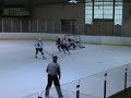 Dillan slides one by the Troy B1 goalie