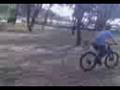 jump over kid on push bike