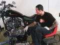 www.custom-choppers-guide.com In this Harley Davidson Sportster motorcycle maintenance video you'll learn how about collapse clutch cable adjuster, how to adjust clutch, install drain plug, primary chain adjustment, replace gaskets and install covers and fluids. The full length DVD shows you everything you need to know to fire your Harley Davidson mechanic and save money maintaining your own Sporty. I think an oil change is part of this video but not sure. Available on our website.