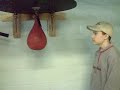 Kid Gets Owned By Punching Bag