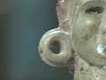 Ohio Historical Society archaeologists discuss the Adena Pipe.