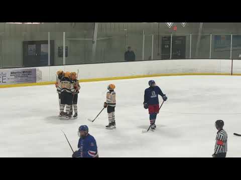 Dawson received puck from offensive at blue line and scores with a slap shot.