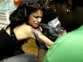 Girl can't handle getting a tattoo