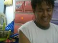 a mongoloid playing his twist car and giving thanz to his dady