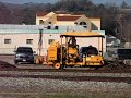 Three speeder- like UP track machines come north through Paso Robles on Sat 17 Feb 2007.