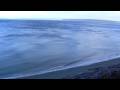 videos de Wind blowing fast moving ripples into the water