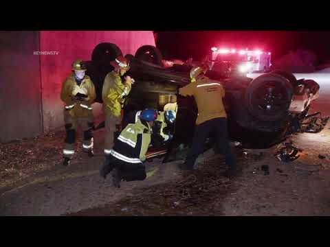 Man Rescued from Pickup Truck Crash into Storm Culvert Under Roadway ...