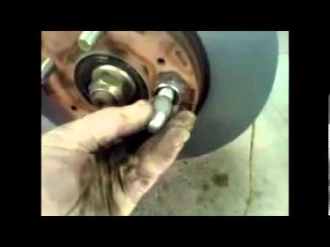 DIY How to replace install front brake pads 2006 Mitsubishi Outlander