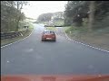 EVO 7s at Cadwell Park followed by 205 Mi16 EVO 7s at Cadwell Park followed by 205 Mi16