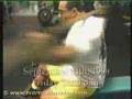 Rotación de tronco con palo sentado