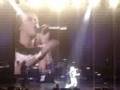 Miley's earpiece gets all tangled. Back up singers+ had to help her fix it. Good And Broken