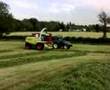 wallace brothers lifting silage flat out.