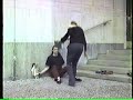 Performance at Berlin Schillertheater with feet, doll, book.